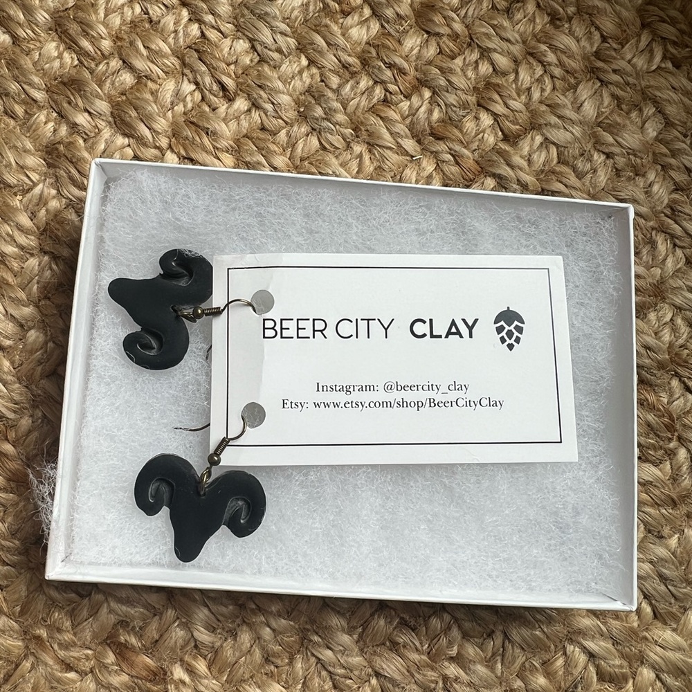 “Rams” head handmade clay earrings